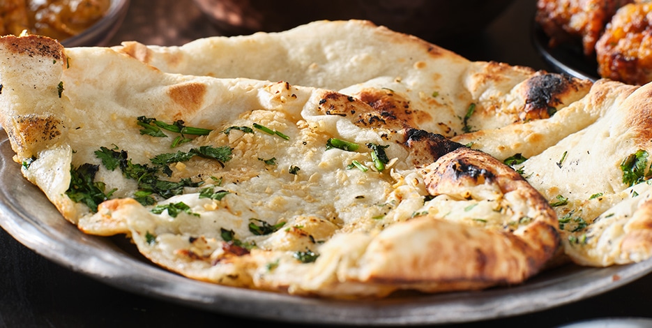 Haveli Indian Cuisine in North Conway features naan, kulcha, bhatura, poori, roti, and paratha breads